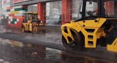 На Верхней Дуброве у ТЦ "Ашан" укладывают асфальт прямо в лужи