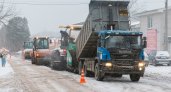 В Коврове асфальт укладывают прямо в снег