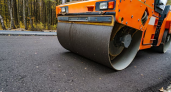 На Лыбедской магистрали начали укладку асфальта для новой двухполосной трассы
